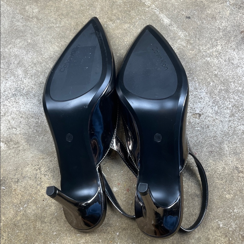 Calvin Klein Metallic Slingback Heels
Size: 9 - Picture 4 of 7